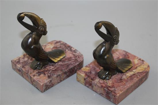 A pair of heron bookends & pair toucan bookends